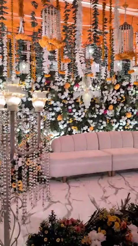 Orange and white florals for a Mehndi night in Lahore.